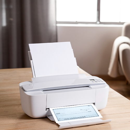 An Printer Printing a Check Is Highlighting Avoiding to Order Personal Checks