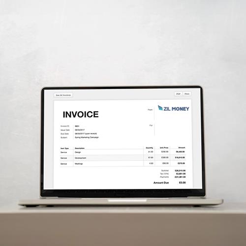 An Invoice Displayed on a Laptop Screen Using Invoice Software