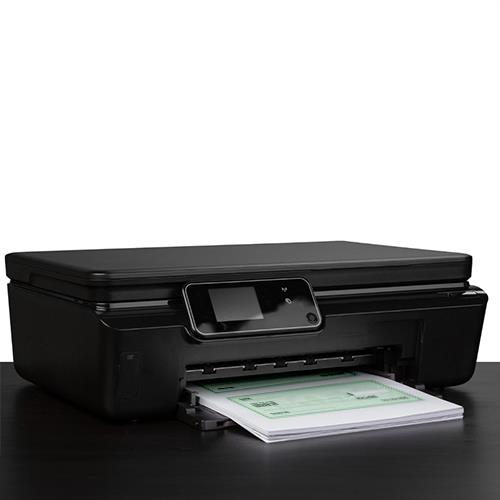 A Printer Actively Printing Checks, Representing the Concept of Personal Bank Checks
