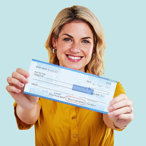Woman Holding Checks, Highlighting the Account Number on Business Check.
