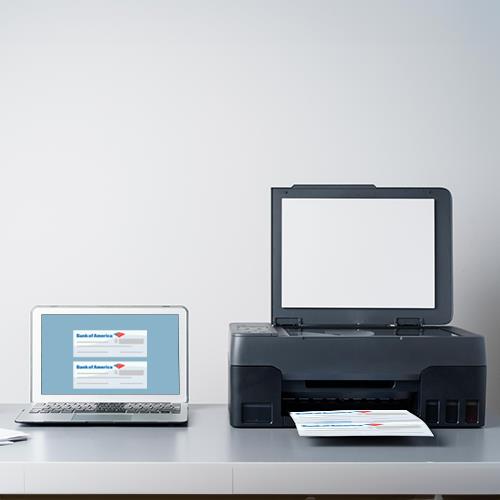 An Office Desk Equipped with a Printer and Laptop, Ready for Printing an Instant Bank of America Cheque