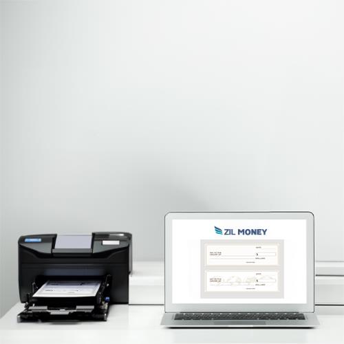 A Laptop Is Sitting on a Desk Next to a Printer, Symbolizing the Ability to Print Check Online For Free.