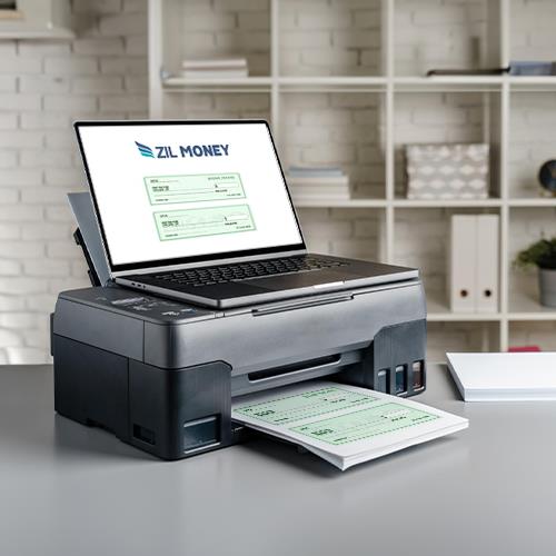 A Printer on a Desk with a Business Check Freshly Printed, Showcasing Software To Print Business Checks Capability.