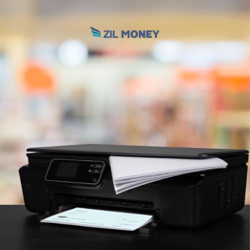 A Black Printer Is Placed on a Dark Background, Symbolizing Check Printing at Home with Customizable Solutions