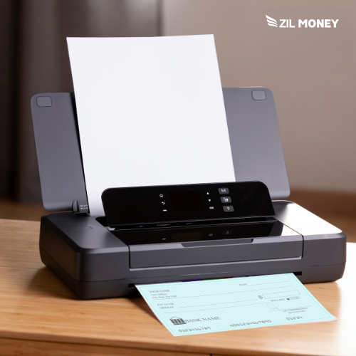 A Printer Is on the Table. Printing Checks Using Blank Check Printing Paper