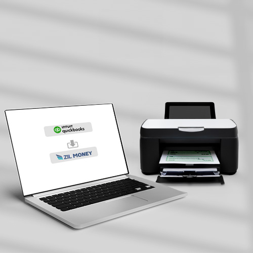 A Printer and Laptop Are on the Table. Check Printing Software for QuickBooks Makes It Easy to Design and Print Checks