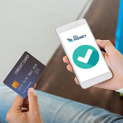 A Hand Holding a Smartphone And a Credit Card, Paying by Credit Card, Maximize Profits with the Best Credit Card Processing Feature