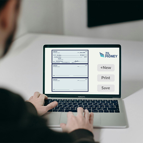 A Person Working On a Laptop Showing Business Checks, Print, and Customize Efficiently