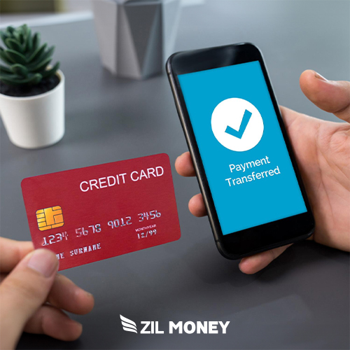 A Person Holding a Credit Card and a Mobile Phone to Make Payment Via Melio Payments Alternative Platform.