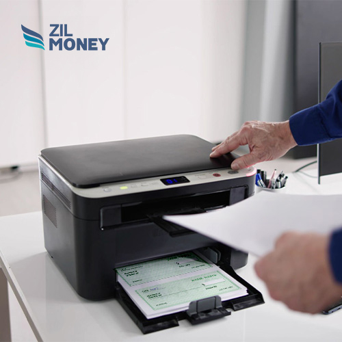 A Person Using a Regular Printer To Print Checks, Instead of Order Bank Checks, Simplify Your Finances Without Cost