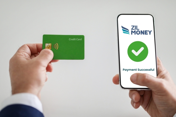 A Man Holding a Smart Phone And A credit Card, Send Custom Payment Link To Receive Credit Card Payments