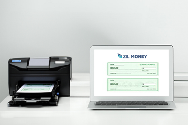 A Printer and A Laptop Printing Checks On Blank Stock Paper, Simplifying How To Write A Business Check