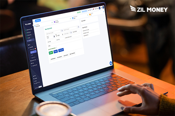 A Man Using a Laptop for Searching Bank Draft Meaning from the Platform to Simplify Cash Flow