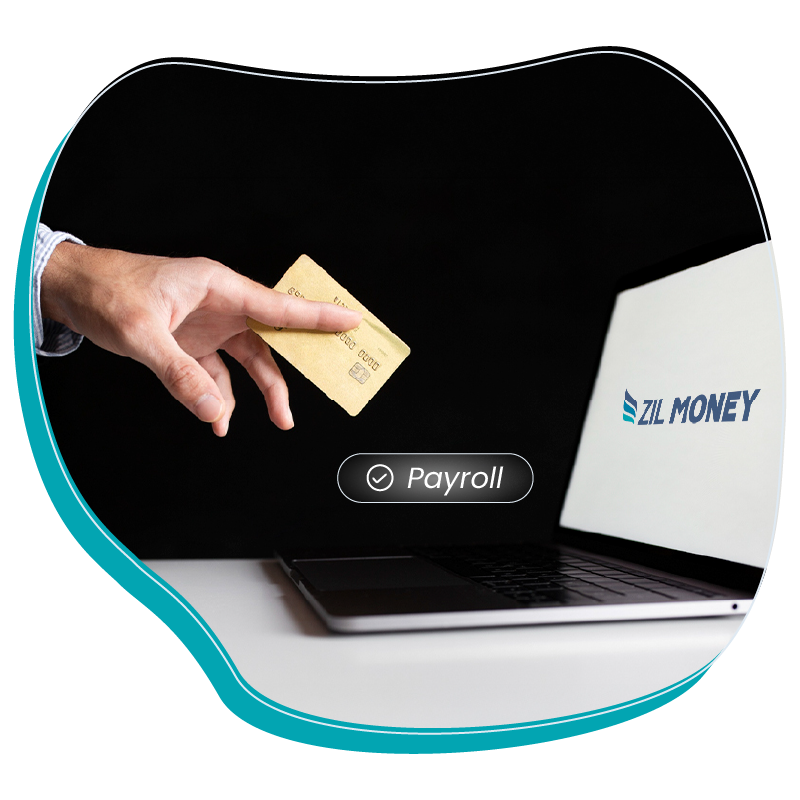 Optimize Payroll Operations Using Credit Cards, A Hand Holding a Credit Card Infront of a Laptop