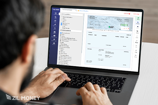 A Man Using A Laptop To Design Checks Effortlessly Via the Platform