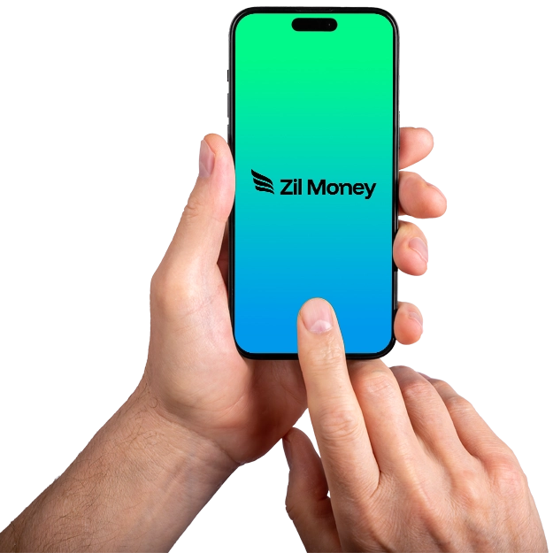 <br />
All Finances in One Place: Hands Hold a Smartphone Displaying the Zil Money App.