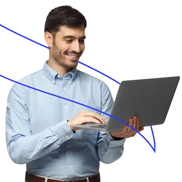 A smiling man uses a laptop, representing the efficiency and positive Impact of Credit Facilities on business.