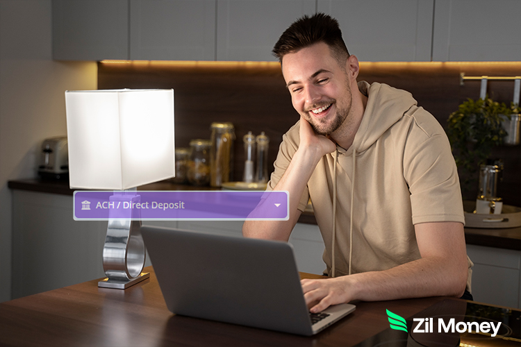 A Smiling Man Using A Laptop to Make a Direct Deposit Easily. How Direct Deposit Is Transforming Vendor Payments in 2025