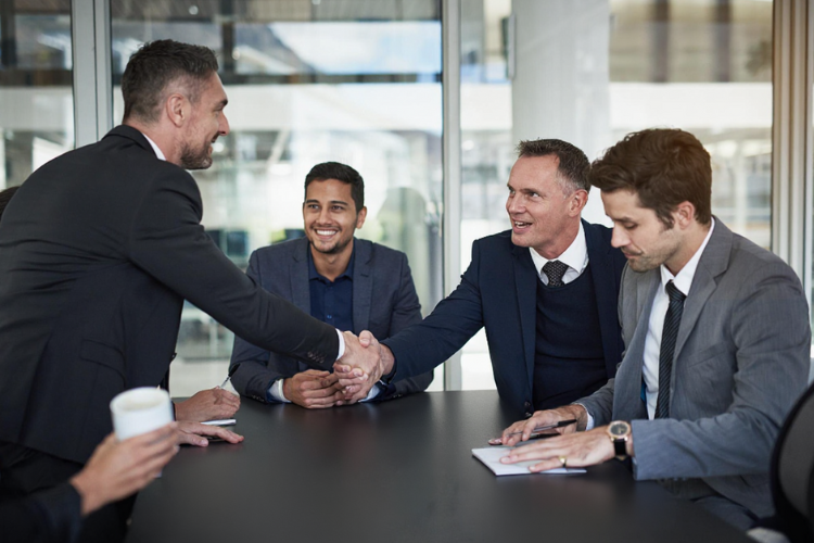 A Businessman Using A Laptop to Make a Payment Easily. Discover How Networking with Trusted Payment Platforms Builds Business Relationships.