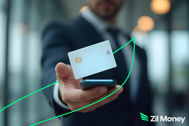 A Person Holds a Physical Credit Card Above a Smartphone, with a Green Upward-Trending Line Symbolizing the Growth and Efficiency of Using Virtual Cards.