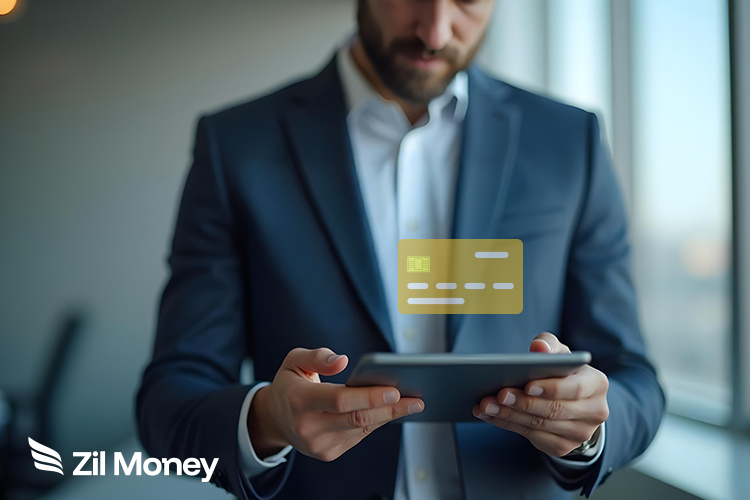 A Man Using a Tablet to Make a Payment Easily Using a Virtual Card Payment. Issue Virtual Cards with Customizable Limits