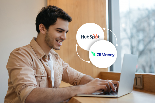 A Man Working On Laptop Showing Zil Money Integration with Hubspot, Zil Money Now Integrates with HubSpot