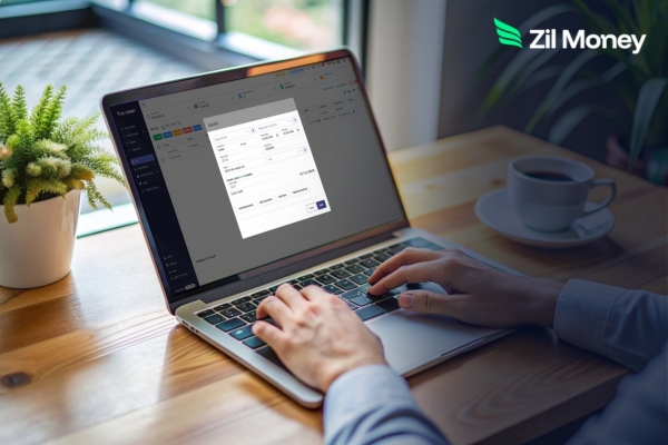 Professional typing on a laptop for a Bill Payment, ensuring a secure and efficient way to manage business bills.