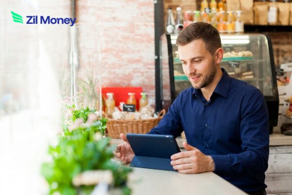Retail Payments Are Bleeding Your Margins Right Now – And the 1 Platform Built to Stop It Retail store owner using a tablet to manage Retail Payments with secure and efficient processing.