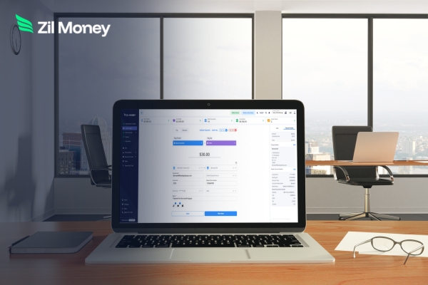 Laptop on a desk showing a secure dashboard to manage wire transfers efficiently in a modern office.