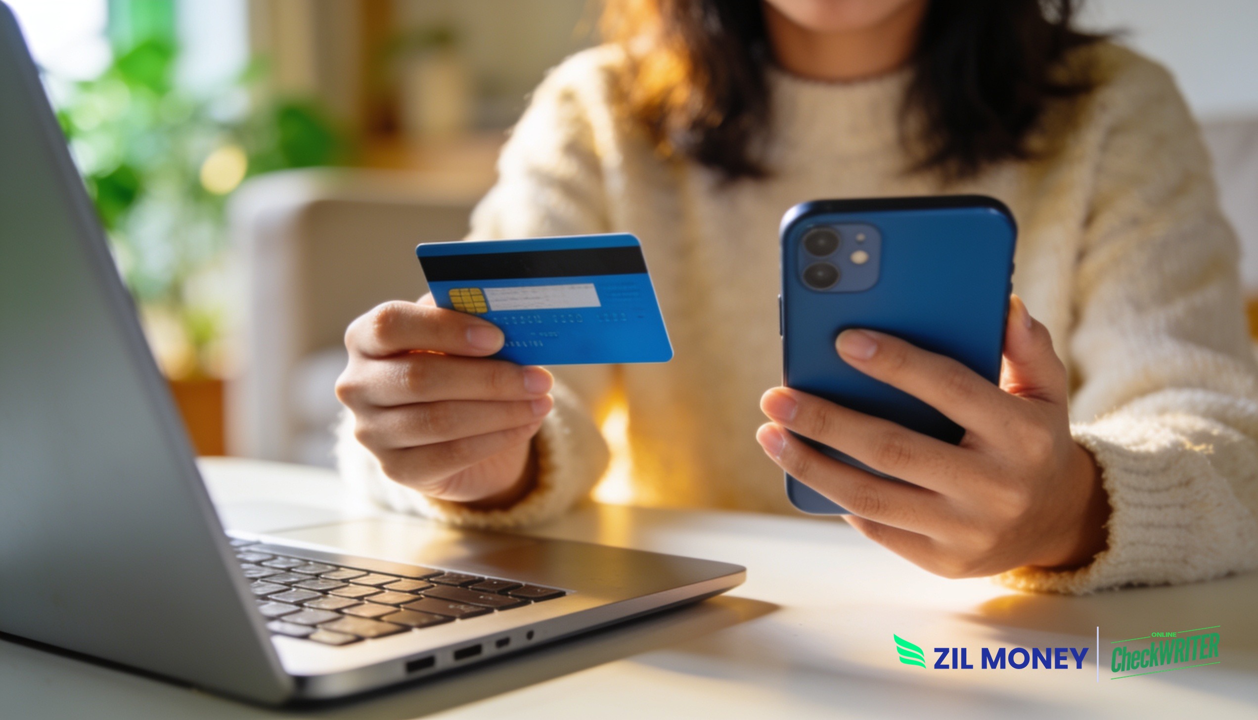 accept-credit-card-payments-online-zm Customer using a credit card and phone to accept credit card payments online